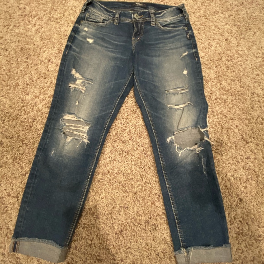 Distressed cuffed capris